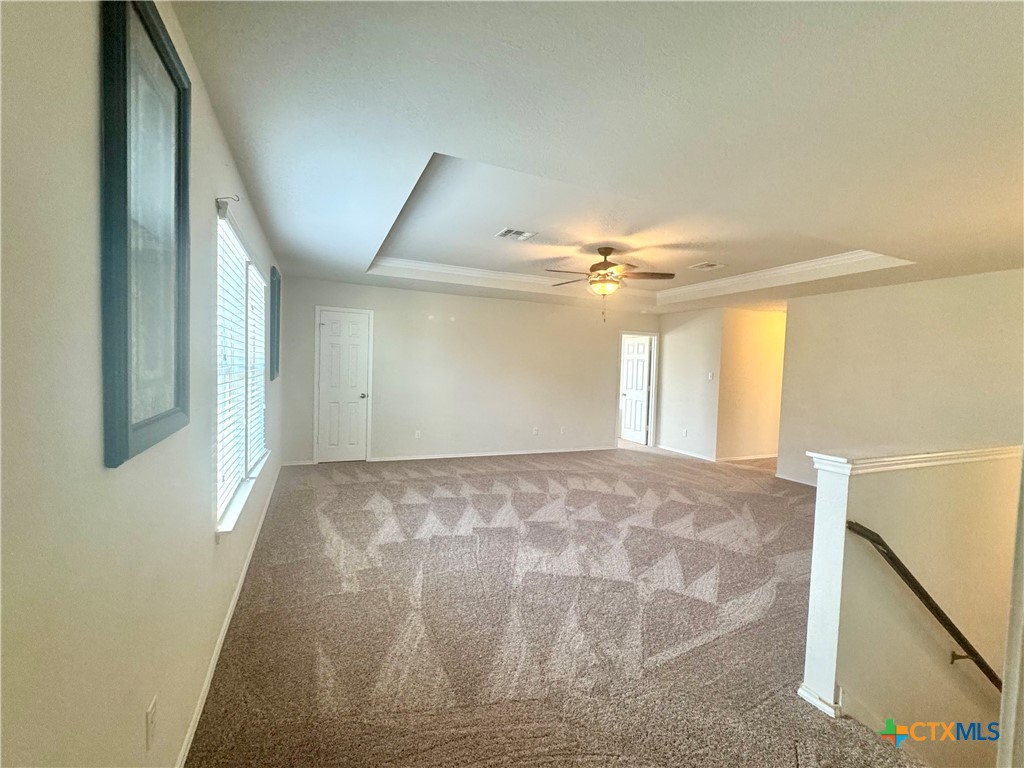 3101 Shawlands Road Killeen, TX 76542 - Photo 20 of 41 a view of a big room with windows and chandelier