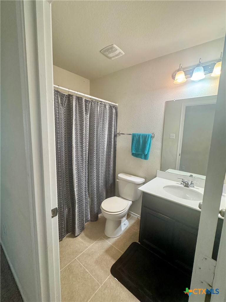 3101 Shawlands Road Killeen, TX 76542 - Photo 25 of 41 a bathroom with a sink toilet and shower