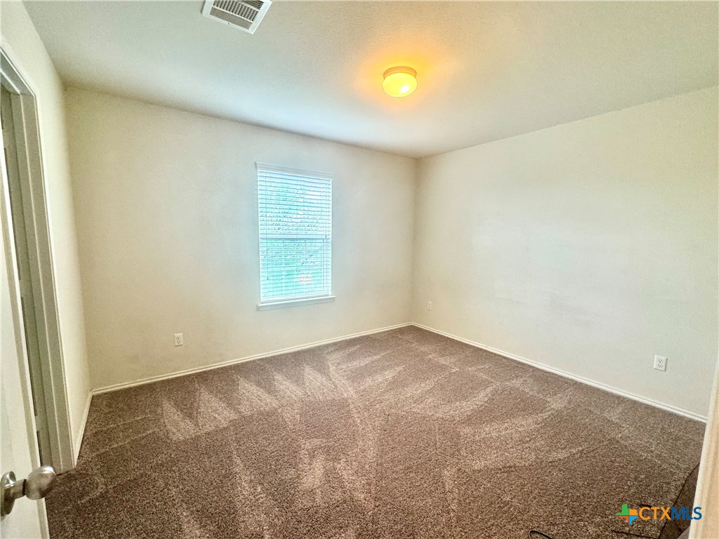 3101 Shawlands Road Killeen, TX 76542 - Photo 31 of 41 an empty room with windows
