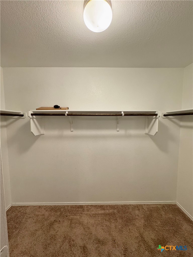 3101 Shawlands Road Killeen, TX 76542 - Photo 32 of 45 a view of a room with racks on the wall