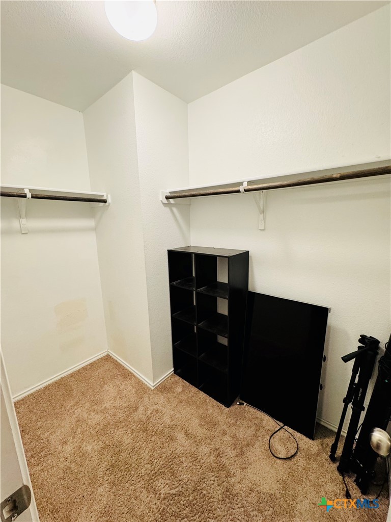 3101 Shawlands Road Killeen, TX 76542 - Photo 36 of 45 a bedroom with a bed and a dresser