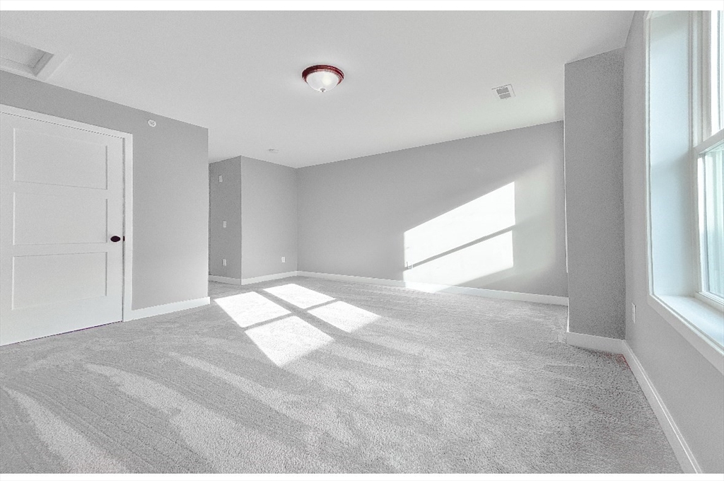 56 Richards Street Worcester, MA 01603 - Photo 20 of 24 a view of empty room with a fireplace