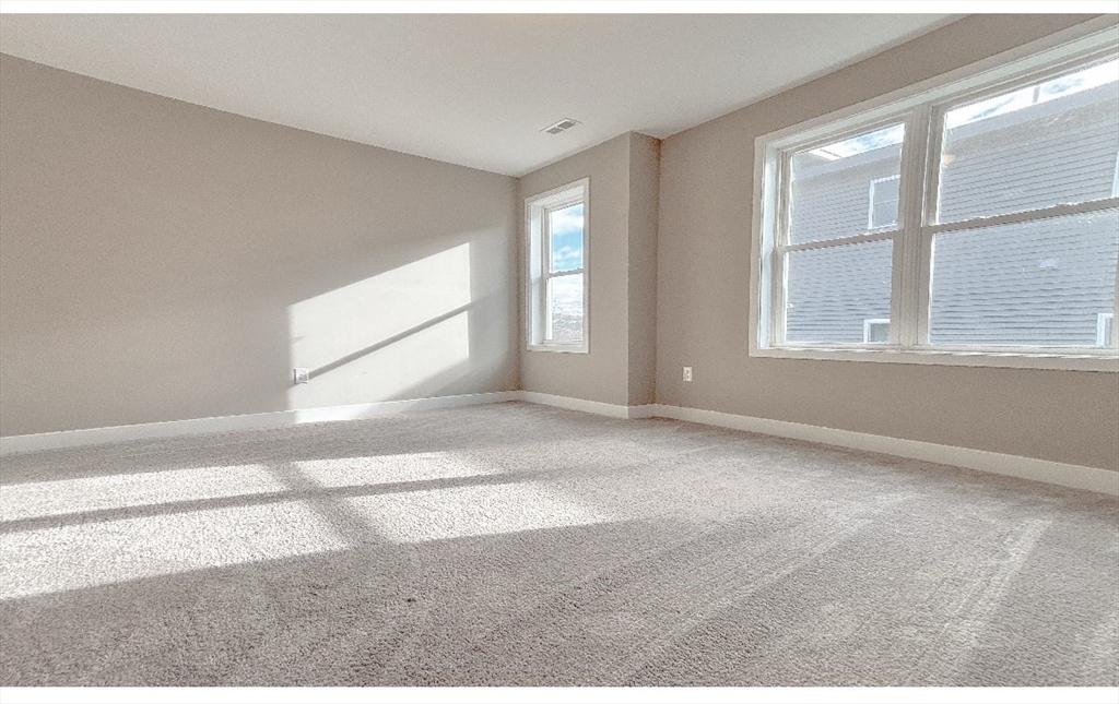 56 Richards Street Worcester, MA 01603 - Photo 21 of 24 a view of empty room with window