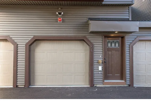 a view of a garage of the house