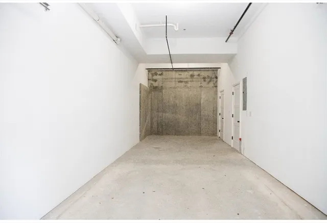 a view of a room with an empty space