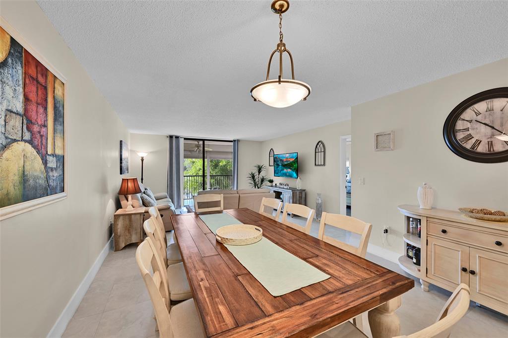 3591 Environ Boulevard, Unit A305 Lauderhill, FL 33319 - Photo 19 of 73 a living room with furniture and a window