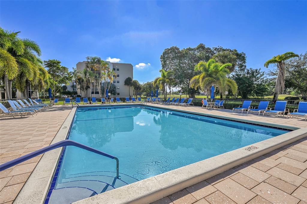 3591 Environ Boulevard, Unit A305 Lauderhill, FL 33319 - Photo 38 of 73 a view of a swimming pool with a terrace