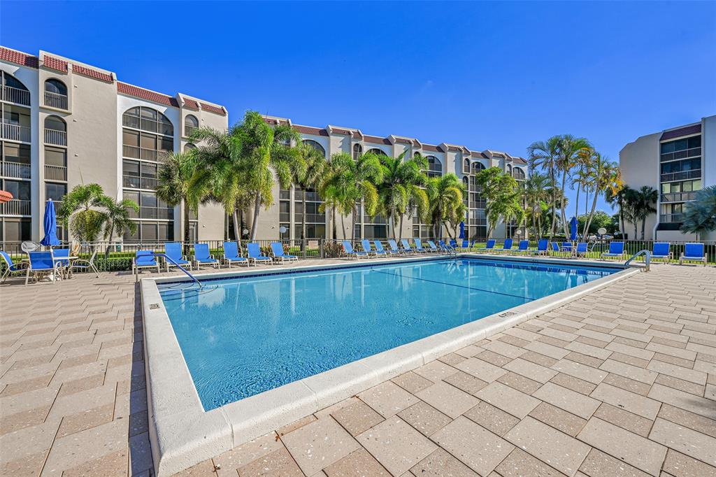 3591 Environ Boulevard, Unit A305 Lauderhill, FL 33319 - Photo 39 of 73 a view of swimming pool with outdoor seating