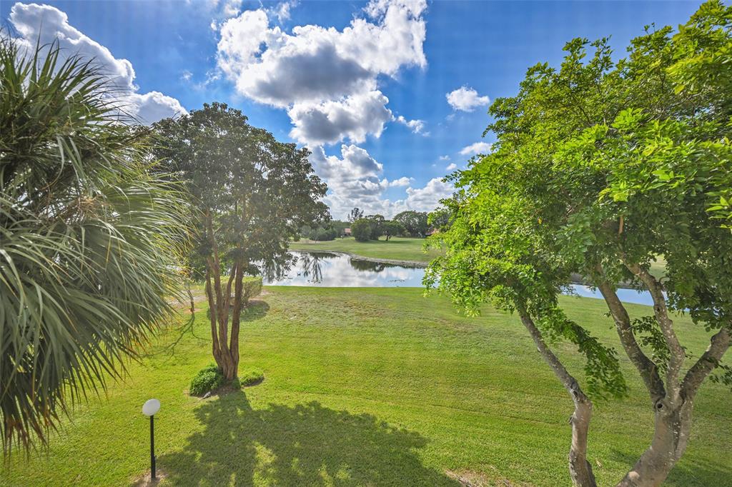 3591 Environ Boulevard, Unit A305 Lauderhill, FL 33319 - Photo 47 of 73 a view of an outdoor space and a yard
