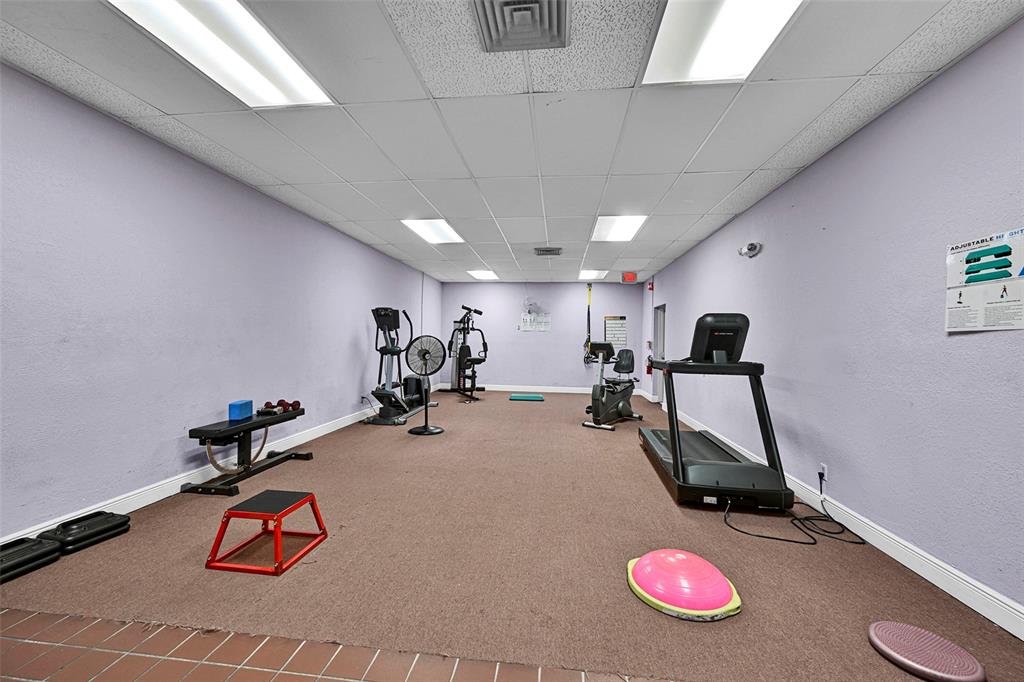 3591 Environ Boulevard, Unit A305 Lauderhill, FL 33319 - Photo 50 of 73 a view of a room with gym equipment