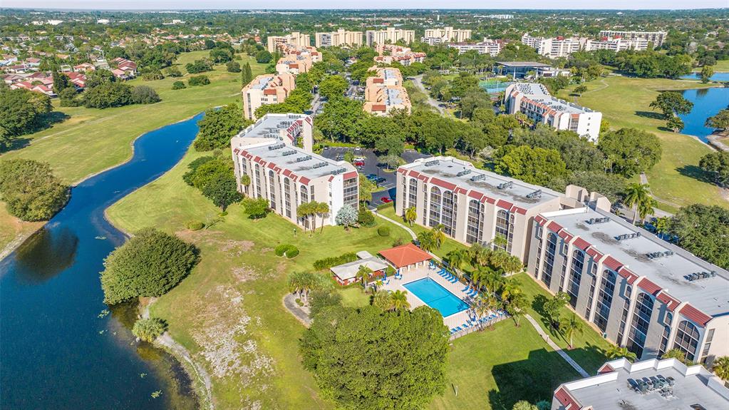 3591 Environ Boulevard, Unit A305 Lauderhill, FL 33319 - Photo 71 of 73 an aerial view of a house with a garden