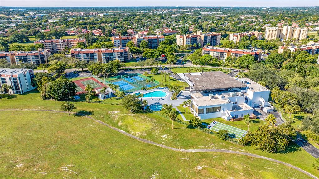 3591 Environ Boulevard, Unit A305 Lauderhill, FL 33319 - Photo 72 of 73 an aerial view of residential houses with outdoor space