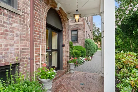 a front view of a house with a porch