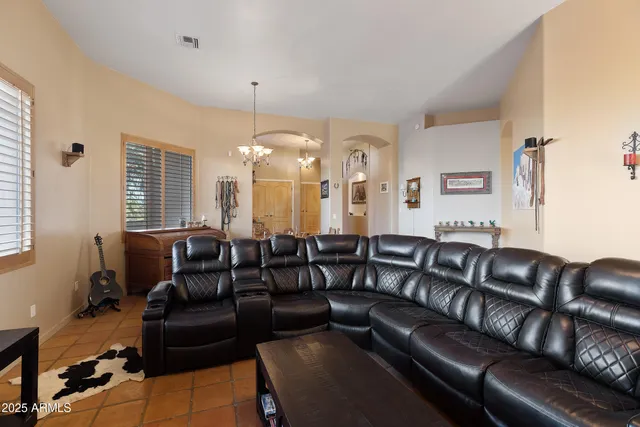 a spacious bathroom with a double vanity sink a and a mirror