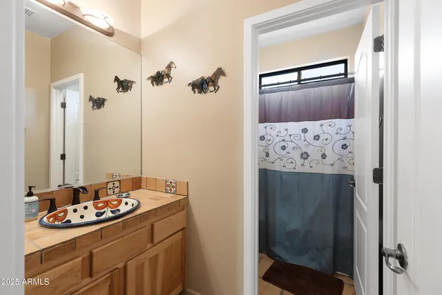 a view of a terrace with couches and sky view