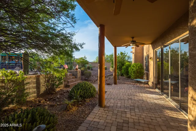 a view of a swimming pool with a patio