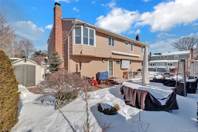 a aerial view of a house with entertaining space