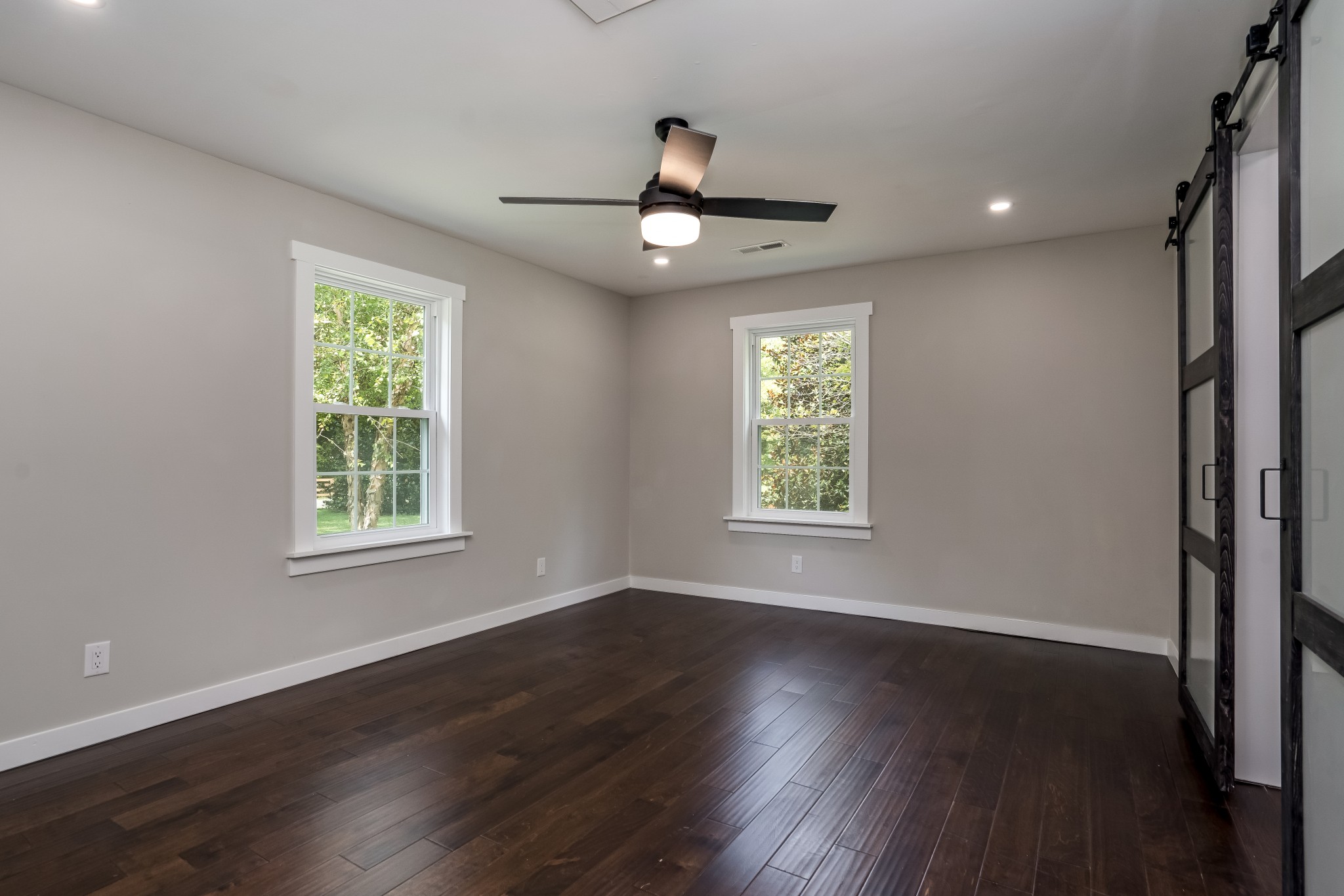 4048 Skelley Road Santa Fe, TN 38482 - Photo 16 of 43 a view of an empty room with wooden floor and a window