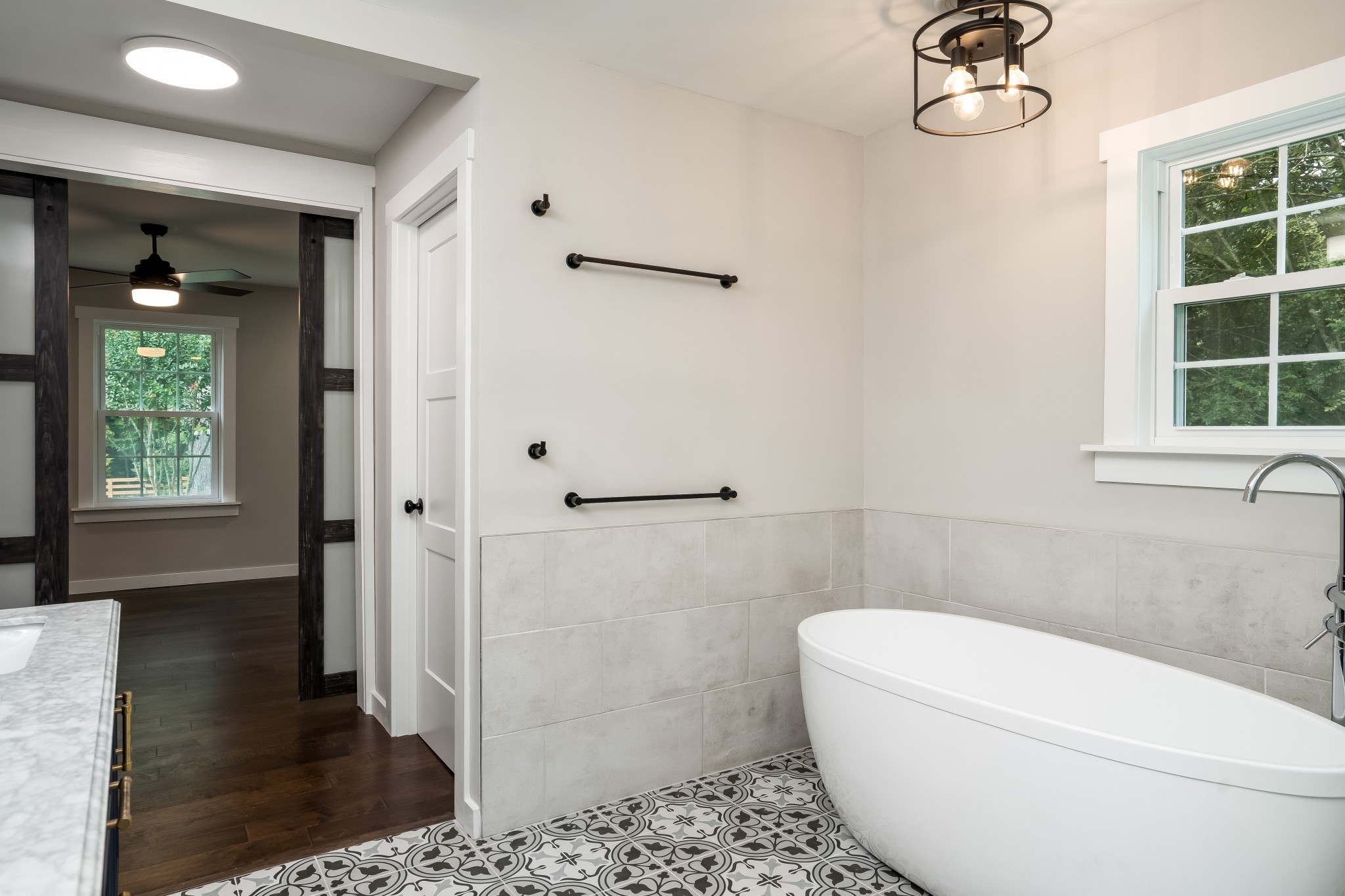 4048 Skelley Road Santa Fe, TN 38482 - Photo 21 of 43 a white toilet sitting next to a bathroom sink and tub