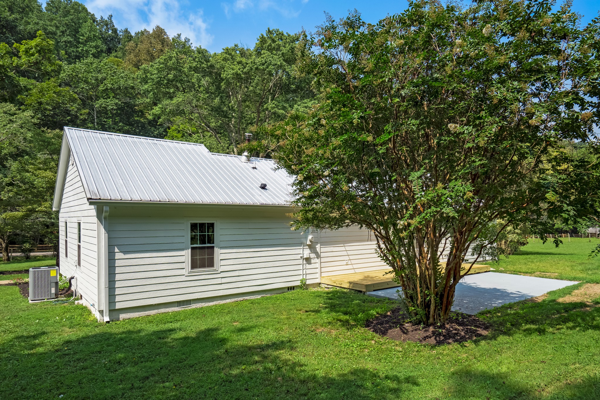 4048 Skelley Road Santa Fe, TN 38482 - Photo 36 of 43 a view of a house with a backyard