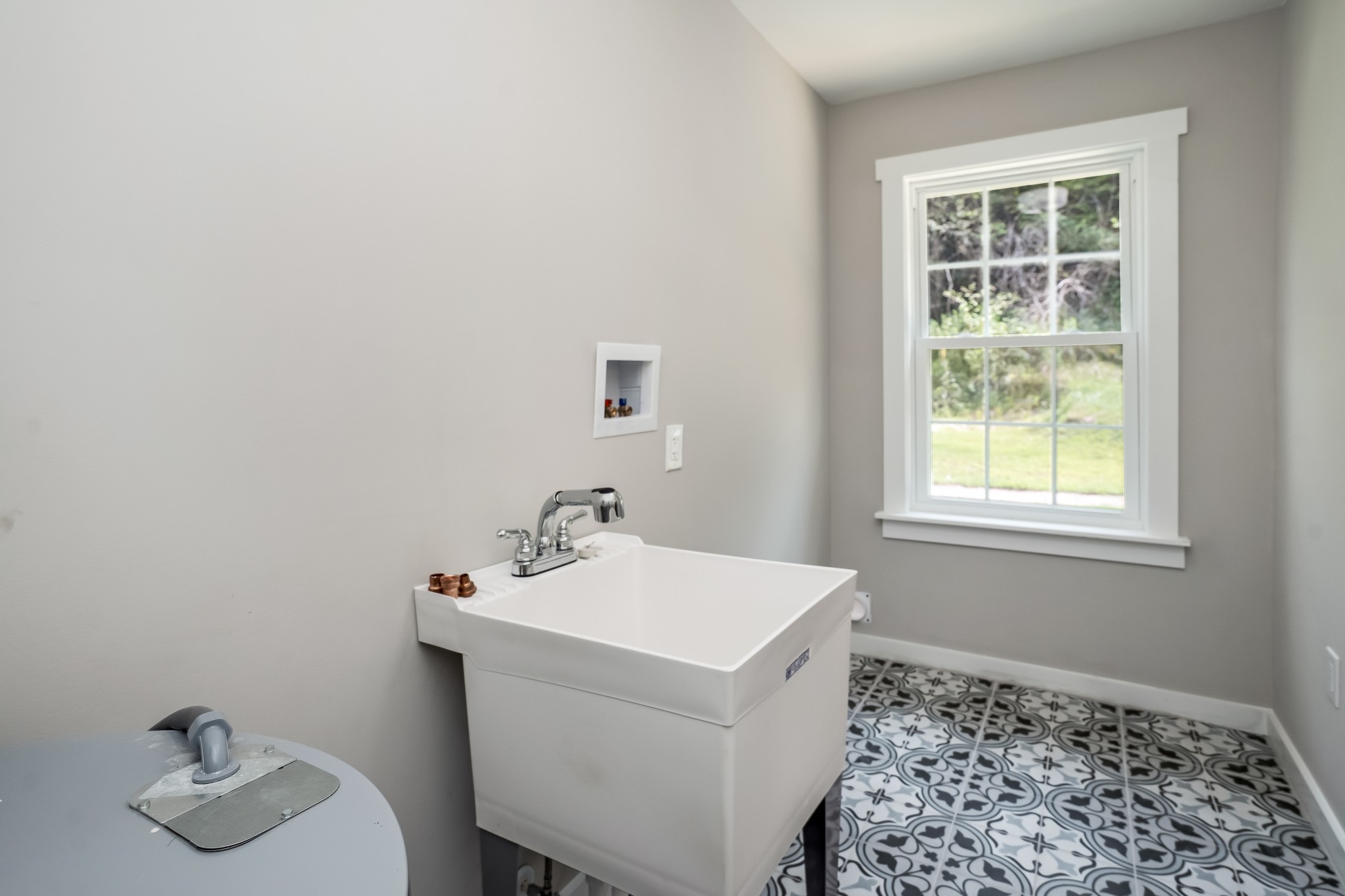 4048 Skelley Road Santa Fe, TN 38482 - Photo 39 of 43 a utility room with a window dryer and washer