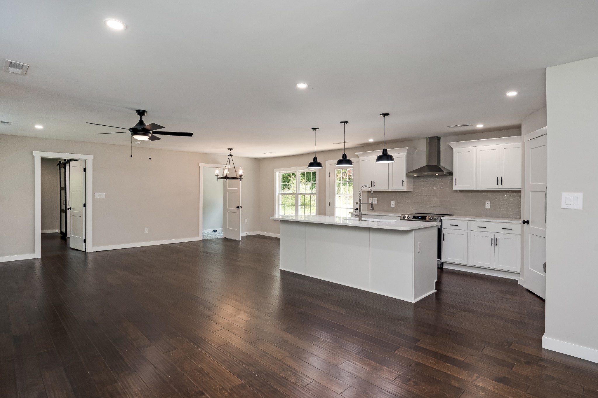 4048 Skelley Road Santa Fe, TN 38482 - Photo 6 of 43 a large kitchen with hardwood floor a window and appliances