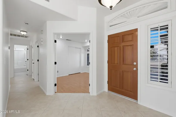 an empty room with closet area