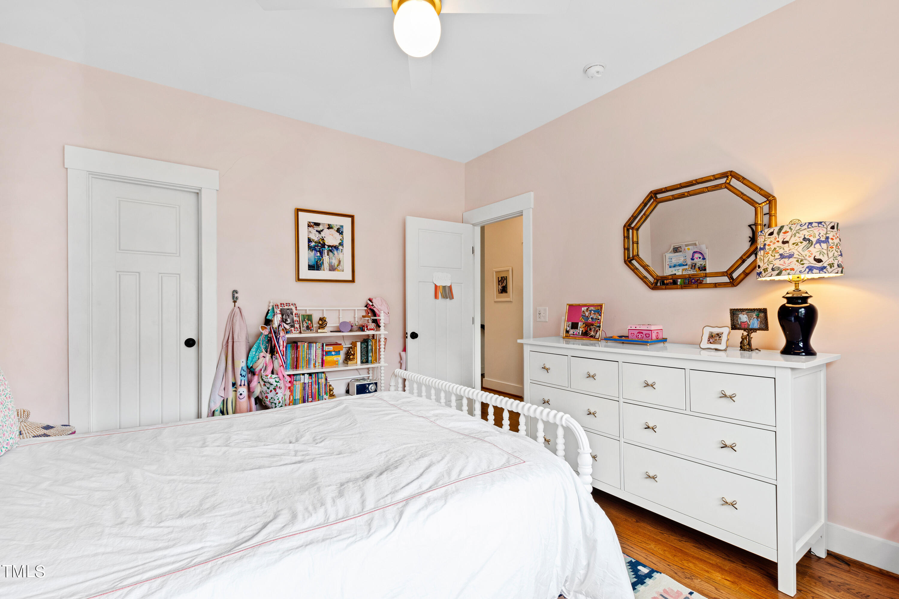 515 Pace Street Raleigh, NC 27604 - Photo 42 of 54 a bed room with a bed and a mirror