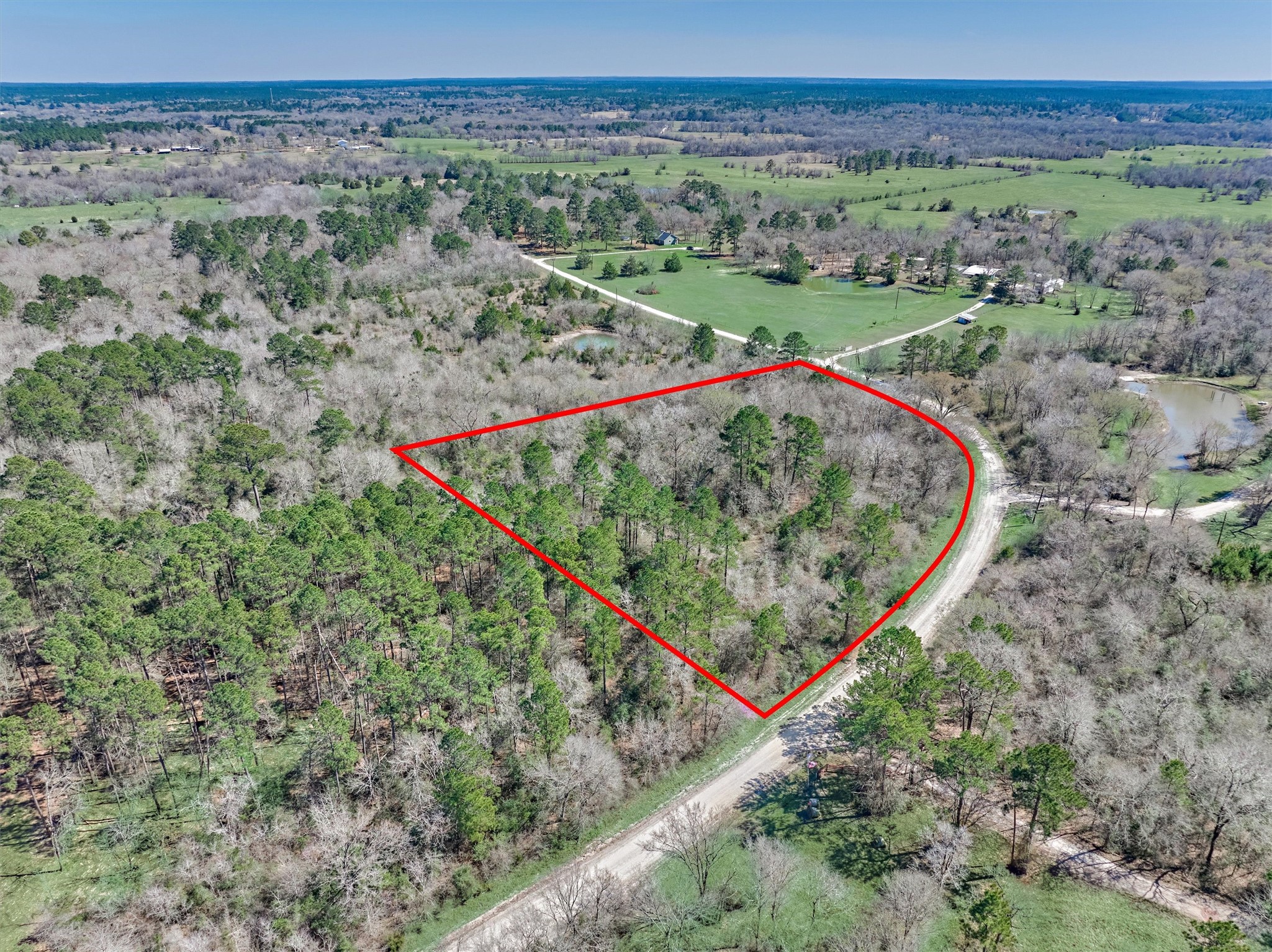 0 Piney Point Road Huntsville, TX 77340 - Photo 5 of 11 an aerial view of a yard