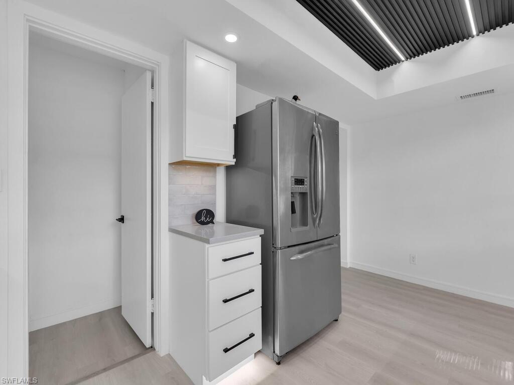 4941 Aztec Circle Naples, FL 34112 - Photo 13 of 36 a bathroom with a shower and a sink