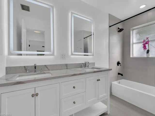 a front view of house with garden