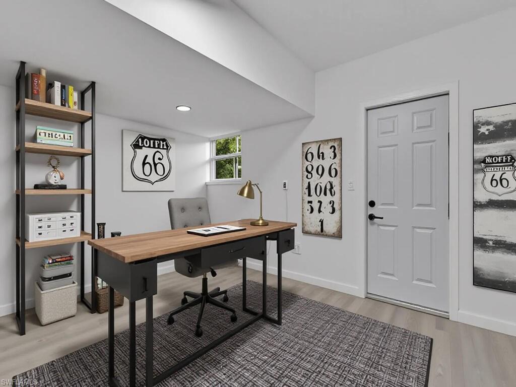 4941 Aztec Circle Naples, FL 34112 - Photo 27 of 36 a view of a workspace with furniture