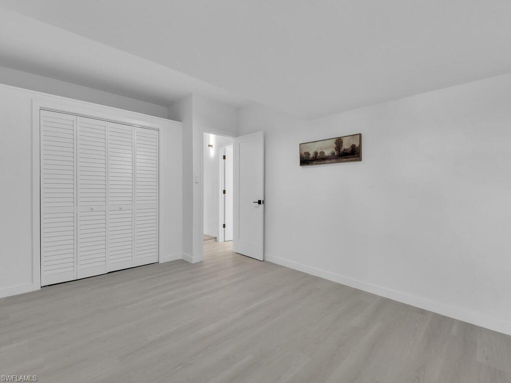 4941 Aztec Circle Naples, FL 34112 - Photo 28 of 36 a view of an empty room