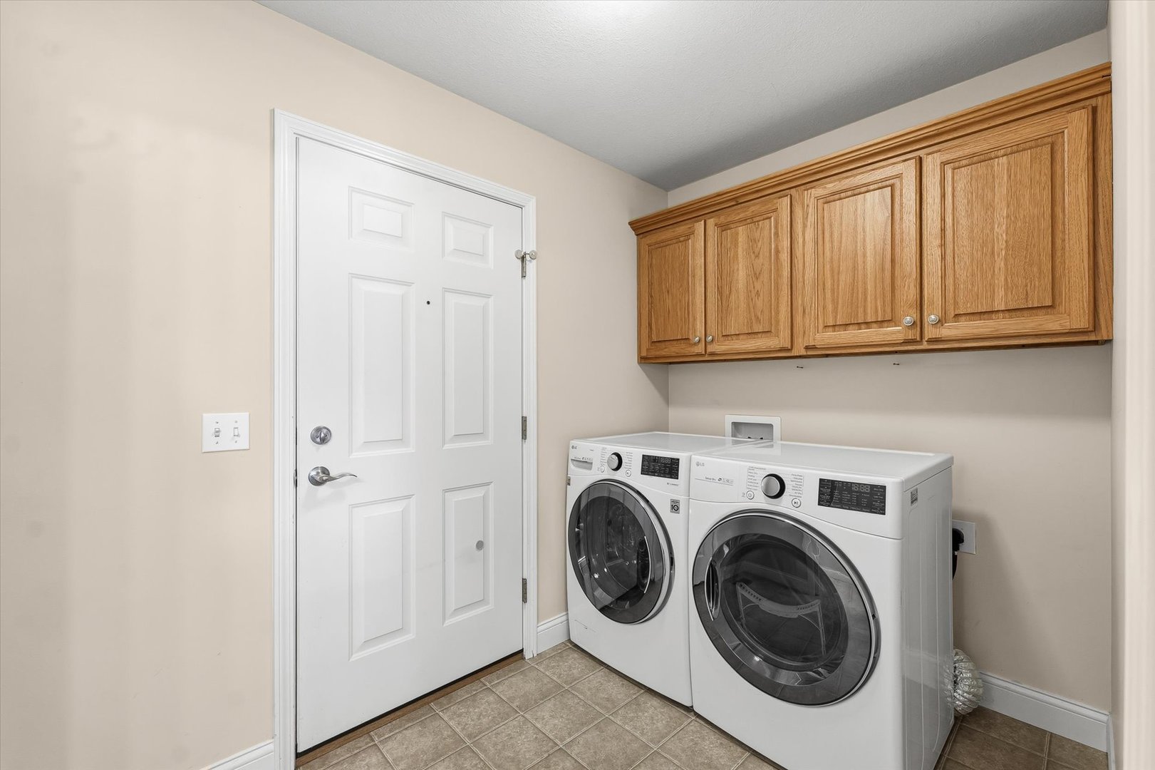 2208 Cyprus Point, Unit 2208 Urbana, IL 61802 - Photo 13 of 30 a utility room with dryer and washer