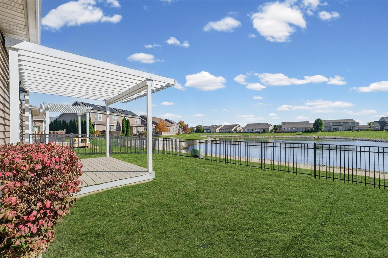 2208 Cyprus Point, Unit 2208 Urbana, IL 61802 - Photo 26 of 30 a view of a backyard