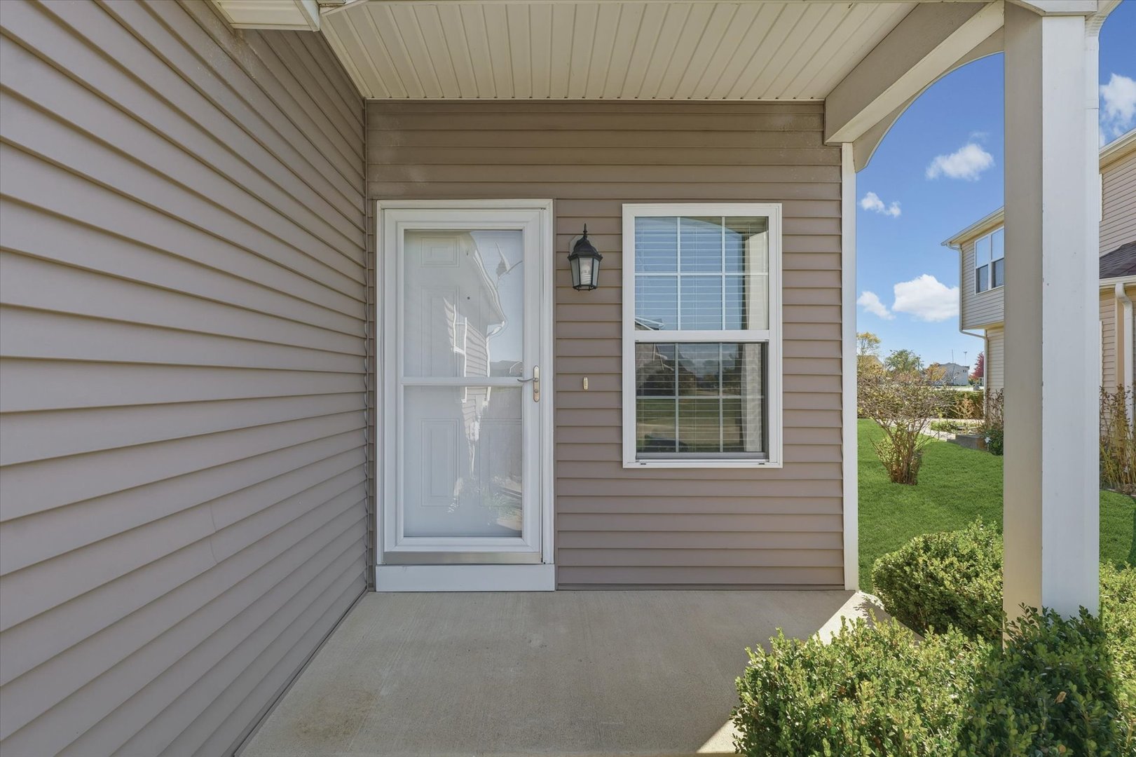 2208 Cyprus Point, Unit 2208 Urbana, IL 61802 - Photo 3 of 30 a view of front door of house