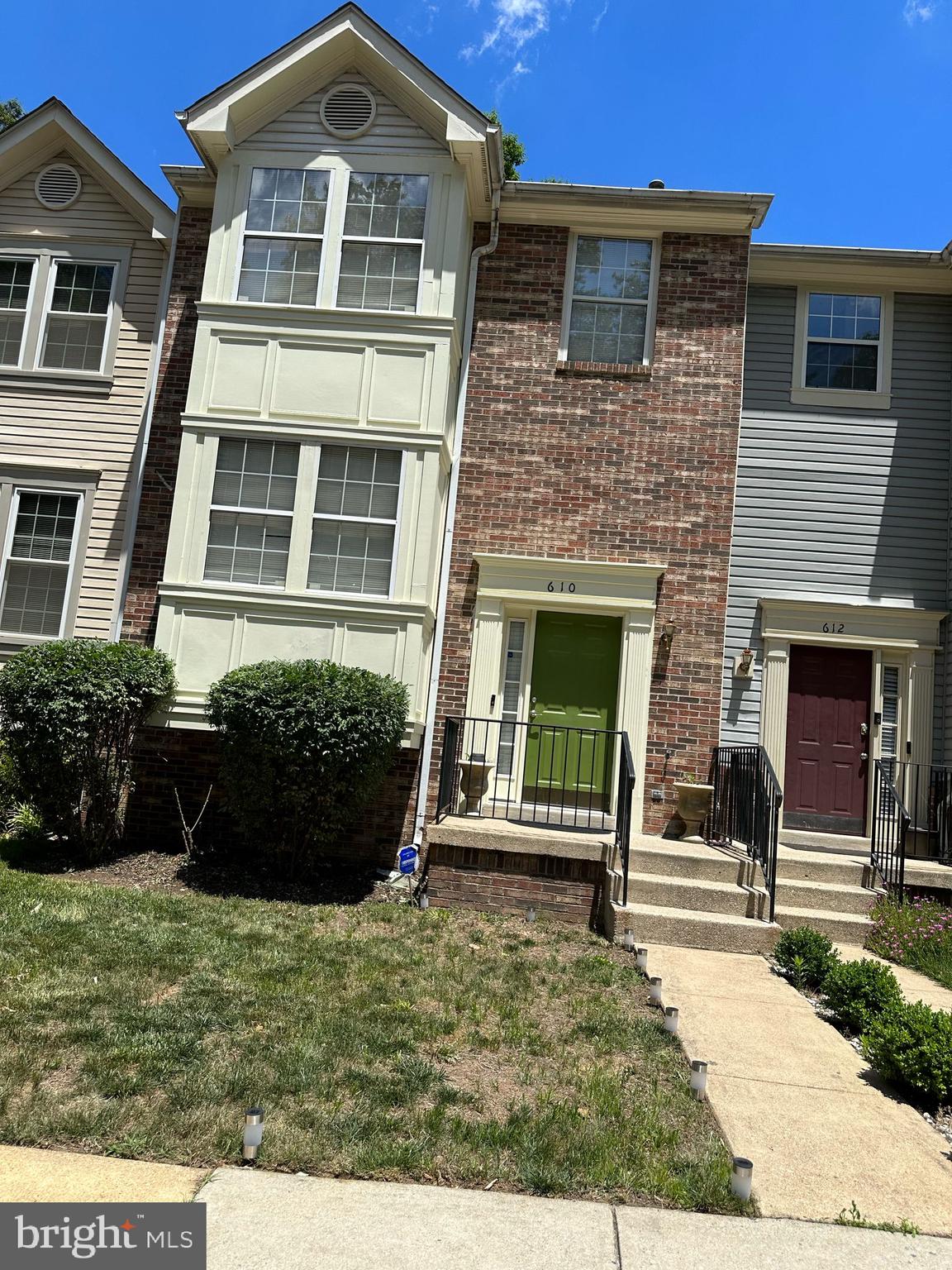 610 Lisle Drive Bowie, MD 20721 - Photo 1 of 1 a front view of a house with garden