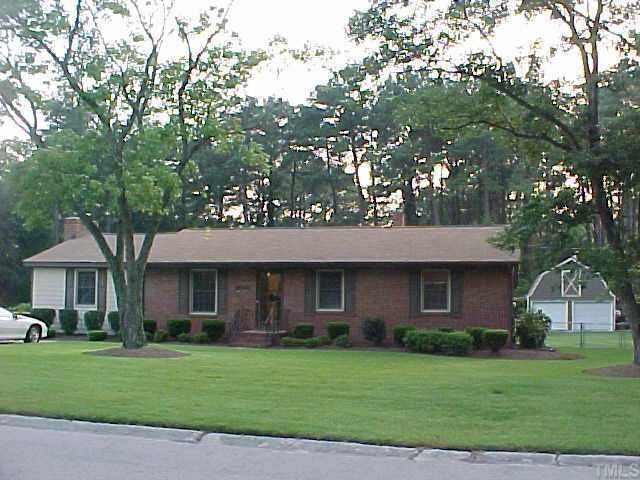 3221 Jupiter Street Raleigh, NC 27604 - Photo 1 of 1 a front view of a house with a yard