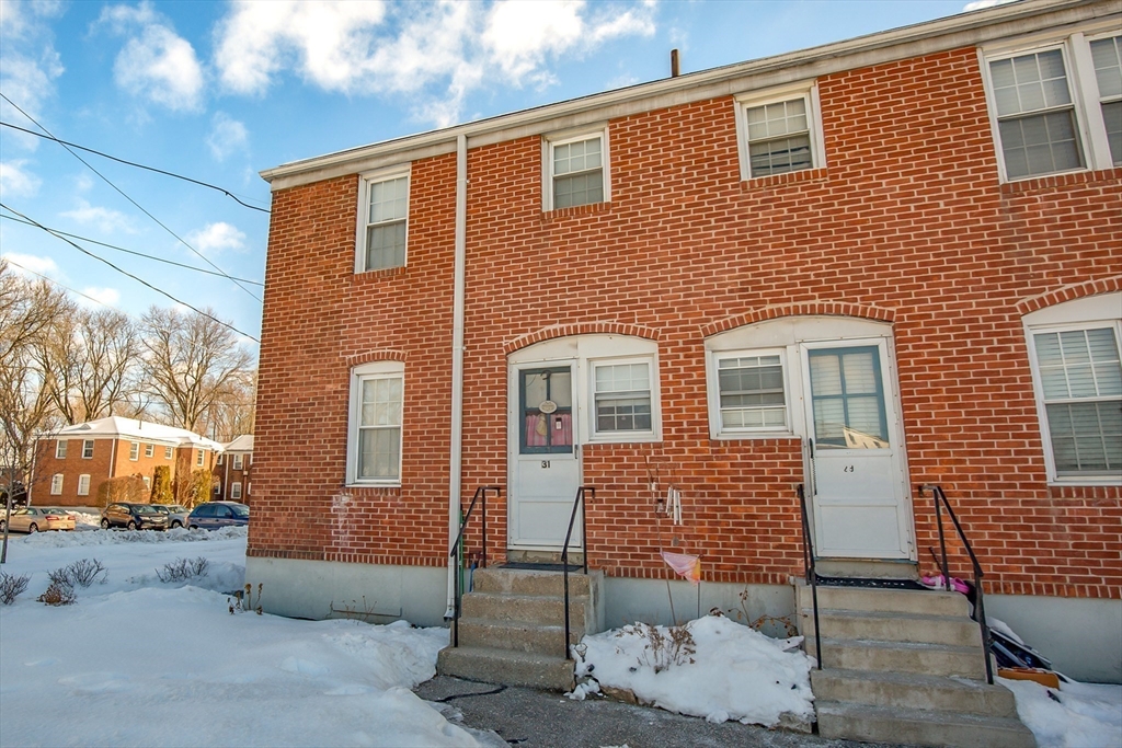 31 Colony Road, Unit 31 West Springfield, MA 01089 - Photo 18 of 20 a front view of a house with a yard