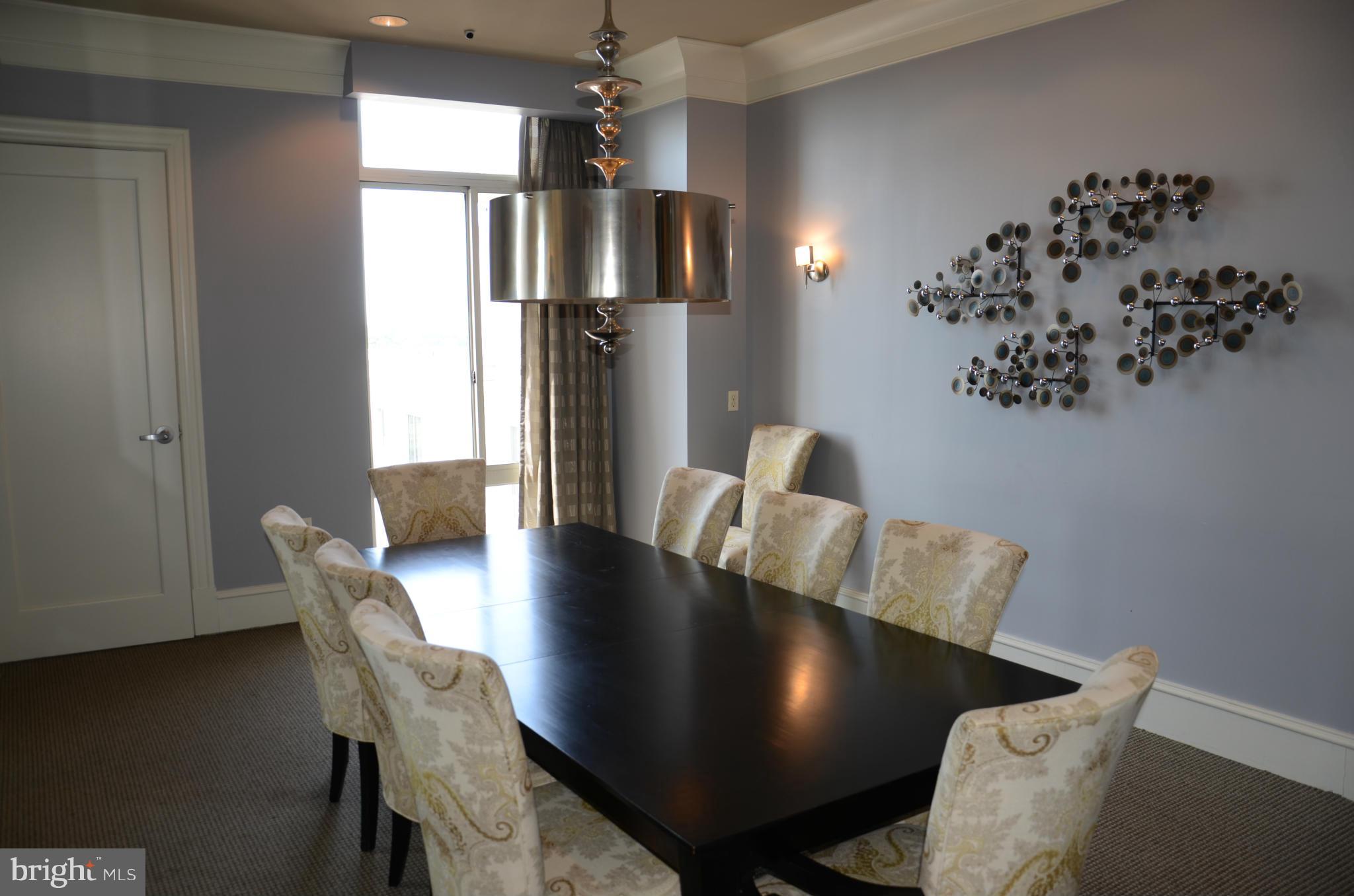 851 North Glebe Road, Unit 1116 Arlington, VA 22203 - Photo 24 of 30 a view of kitchen and dining area with furniture