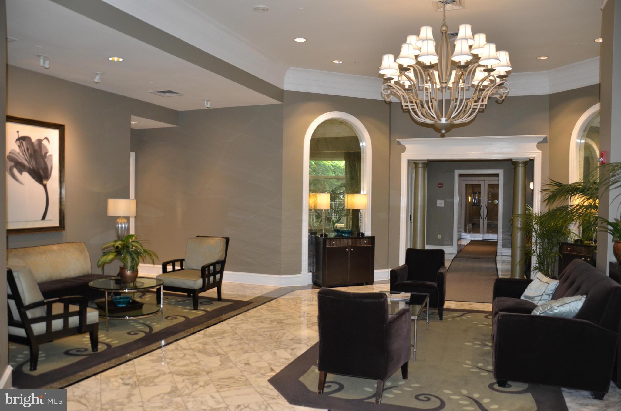 851 North Glebe Road, Unit 1116 Arlington, VA 22203 - Photo 4 of 30 a view of a dining room with furniture