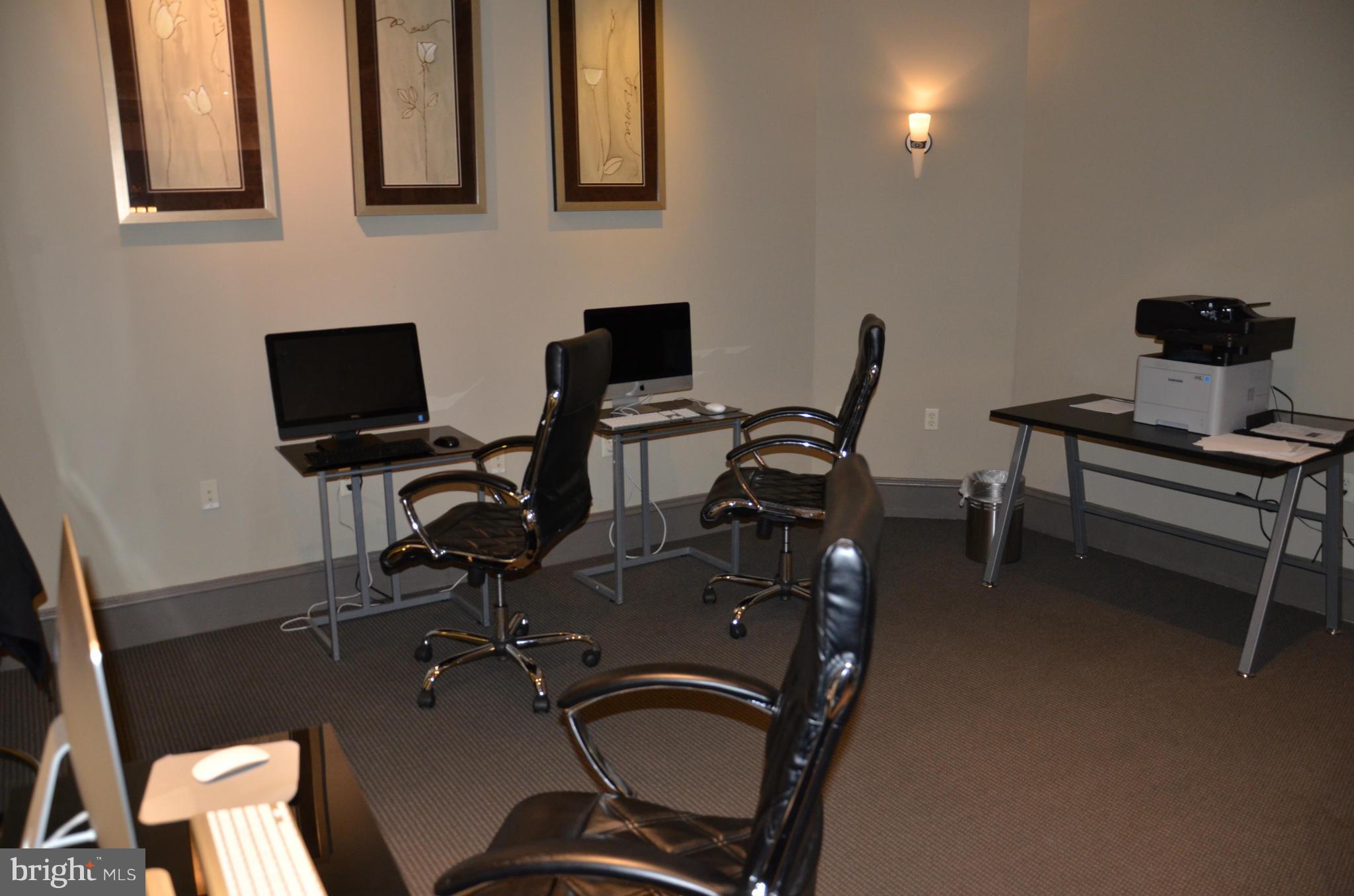 851 North Glebe Road, Unit 1116 Arlington, VA 22203 - Photo 6 of 30 a view of a workspace with furniture and a window