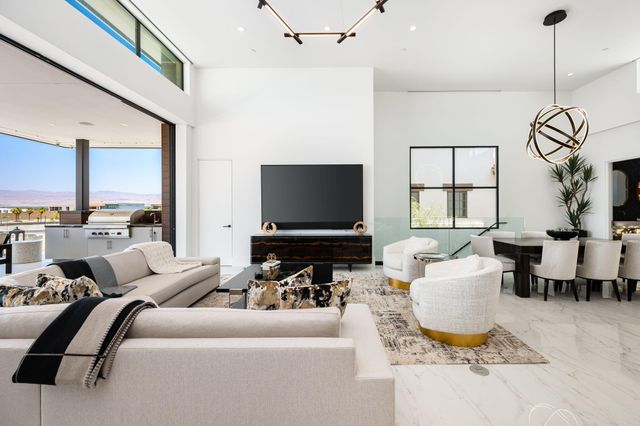 a dining room with furniture and a fireplace