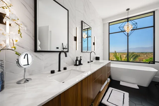 a view of a livingroom with furniture and a fireplace