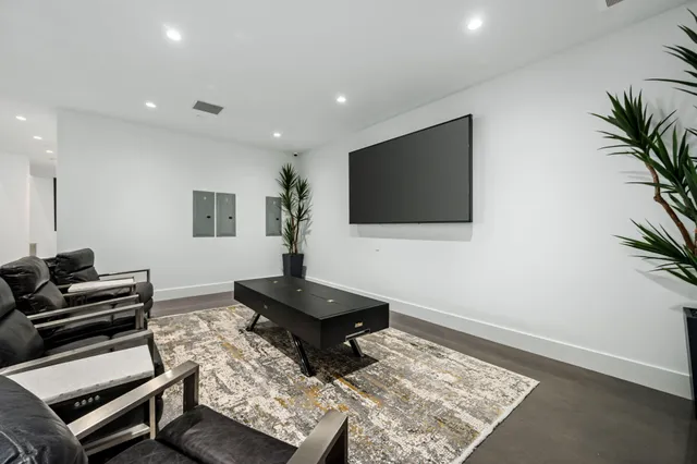 a bedroom with a bed and a lamp