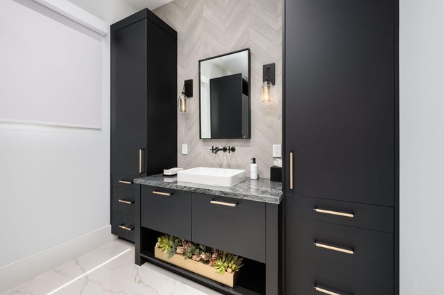 a large white bed in a white room