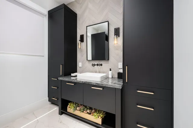 a large white bed in a white room