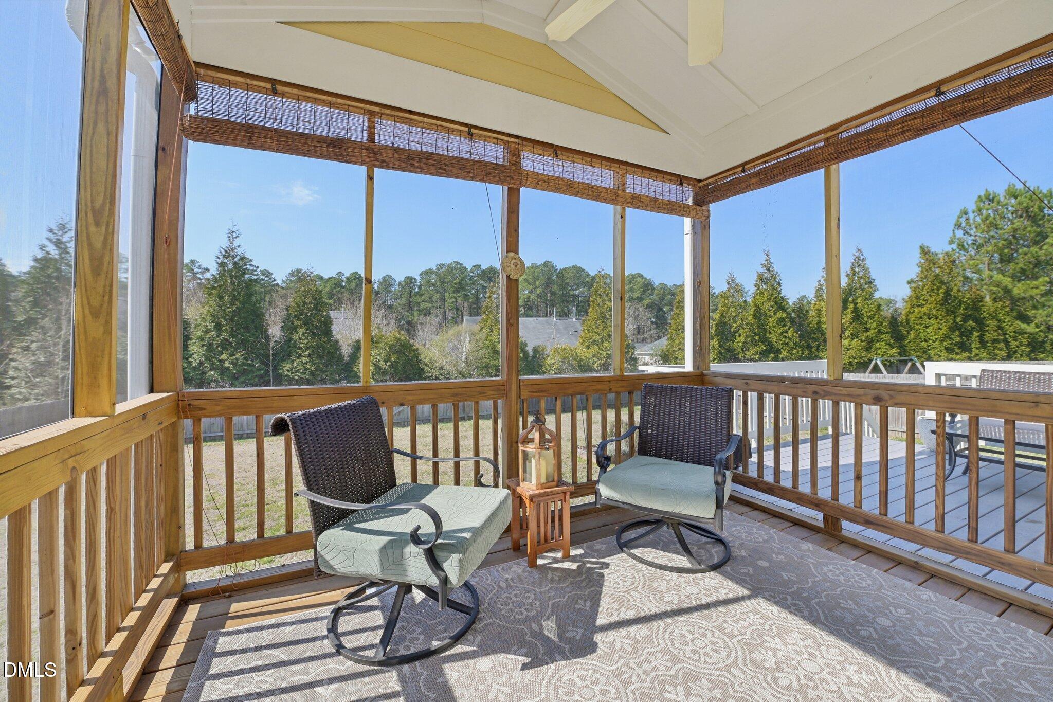 11 Hidden Ridge Court Durham, NC 27707 - Photo 27 of 30 a view of a chair and tables in the balcony