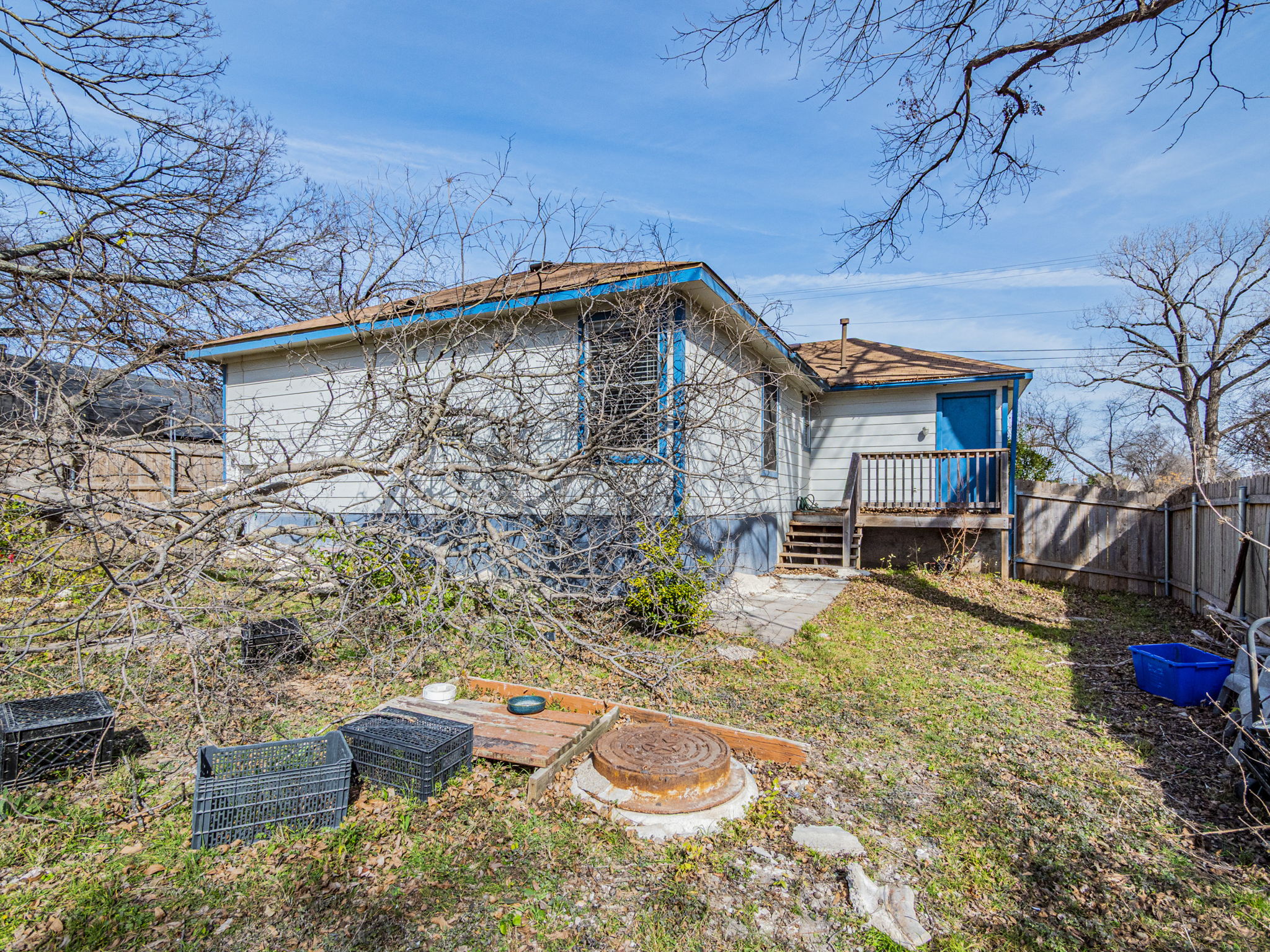 909 West Rundberg Lane Austin, TX 78758 - Photo 15 of 16 a view of a backyard with plants and a patio