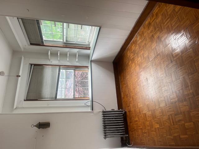 85-33 112th Street Queens, NY 11418 - Photo 10 of 15 a view of an empty room with a window
